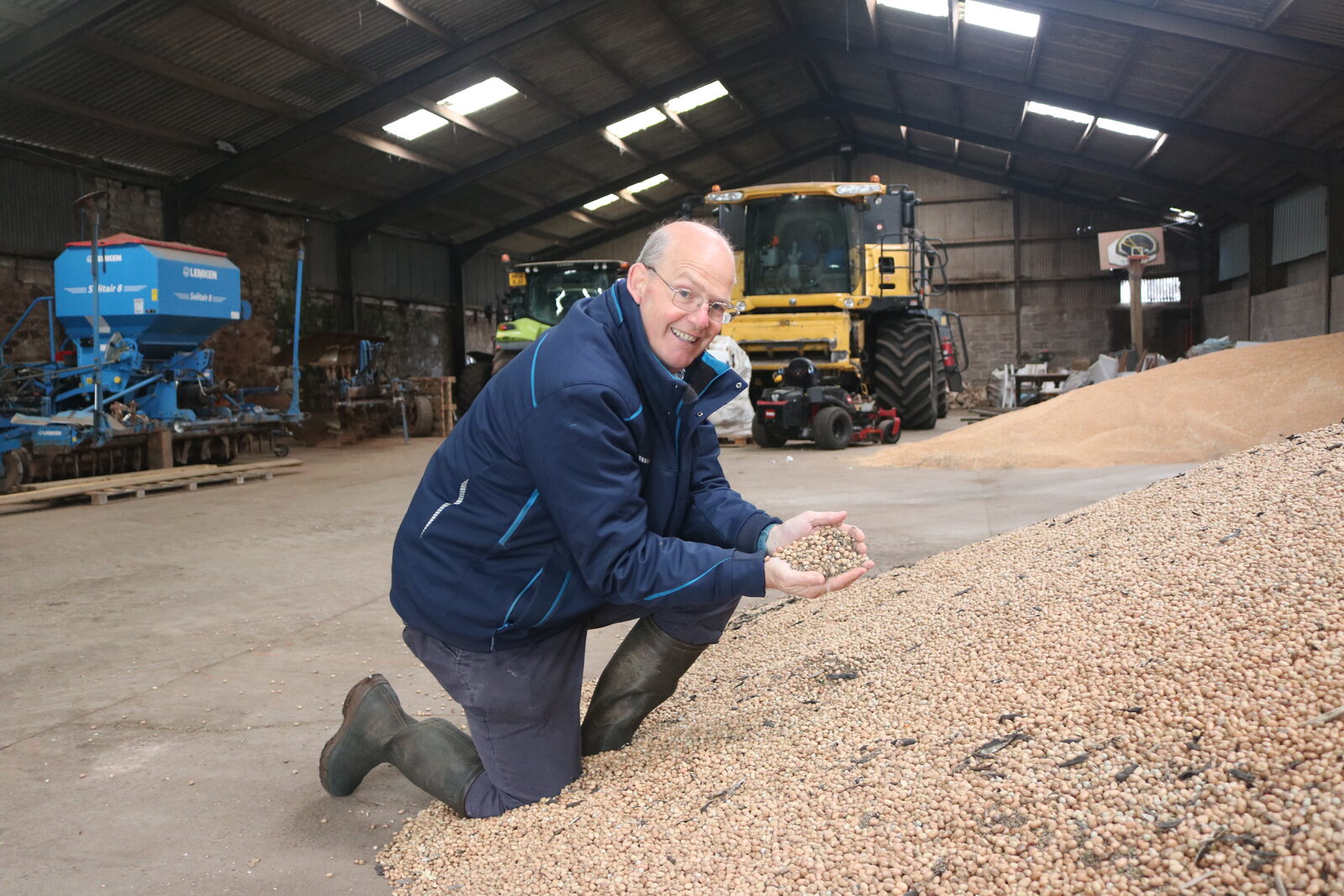 John Seed with home-grown beans at Woodend Farm